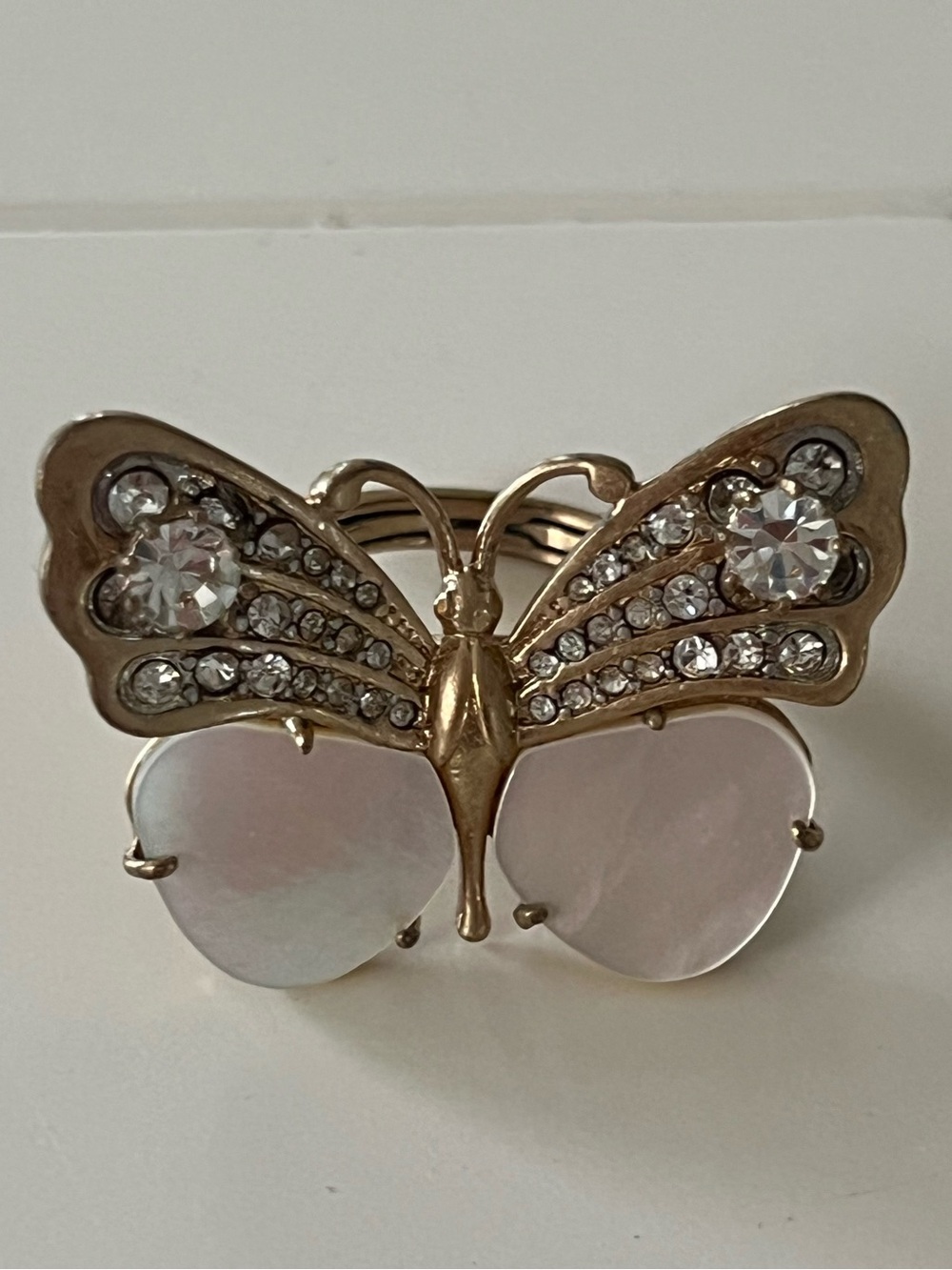 Juicy Couture Gold Tone Butterfly Ring with Clear Crystals and Mother-of-Pearl